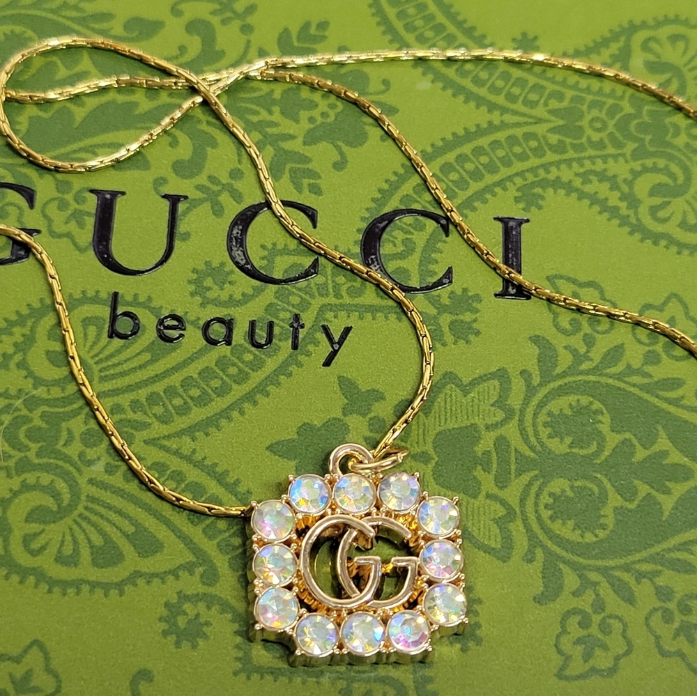 Gucci GG Logo Arora Borealis Crystal Charm, 18" Gold Plated Chain